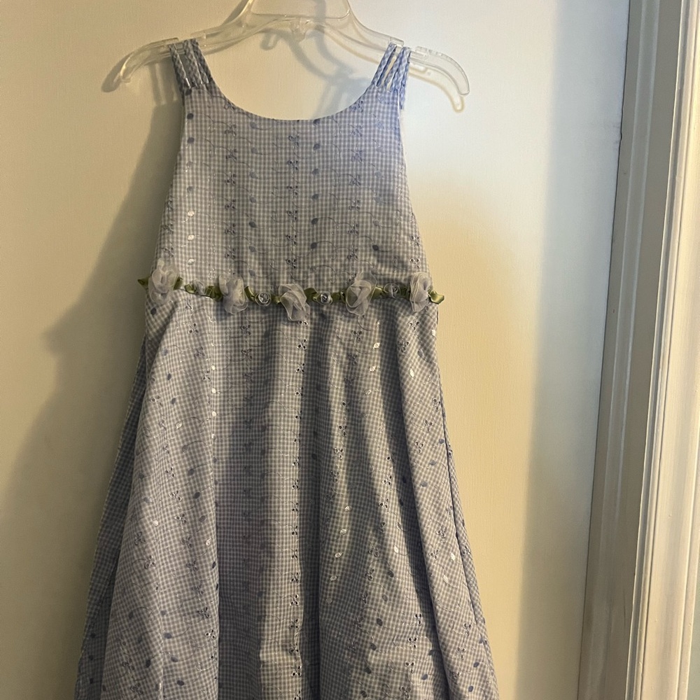 Elegant Blue and White Dress with Floral Details